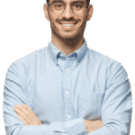 A man wearing glasses and a blue shirt, looking directly at the camera with a neutral expression.