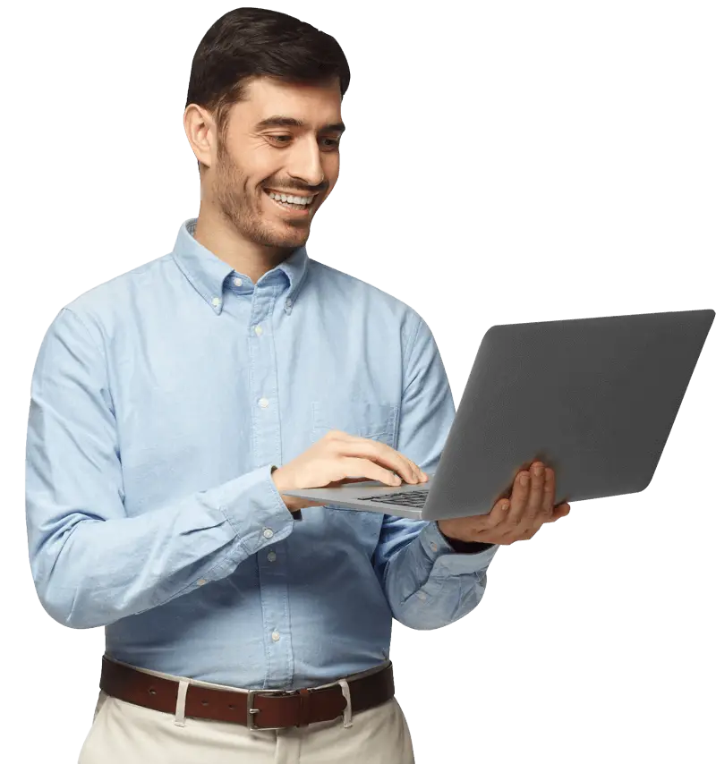 A cheerful man displays a laptop, exuding positivity and engagement.
